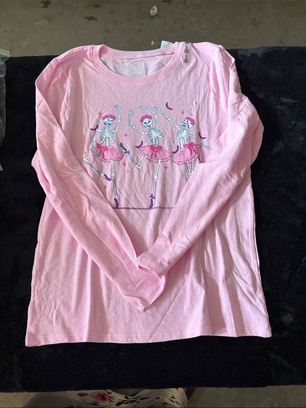Pink skeleton graph shirt size 10-12